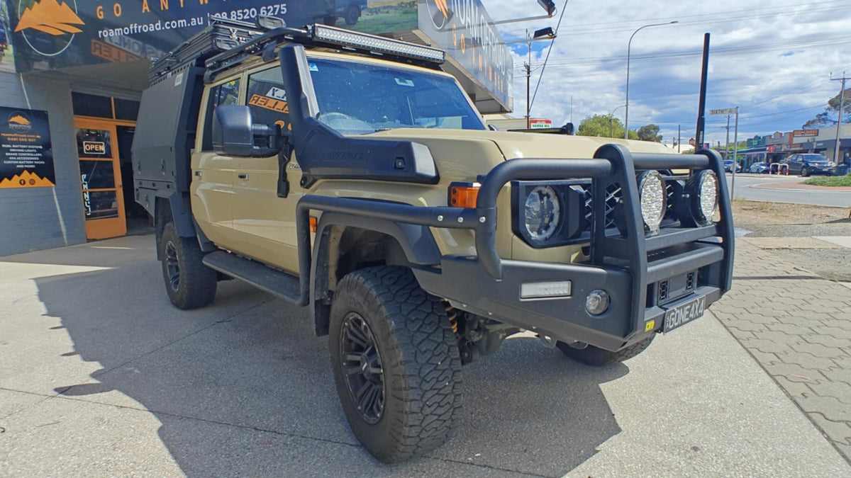 LandCruiser 79 Series dual cab touring build with bull bar, snorkel and canopy at Roam Offroad