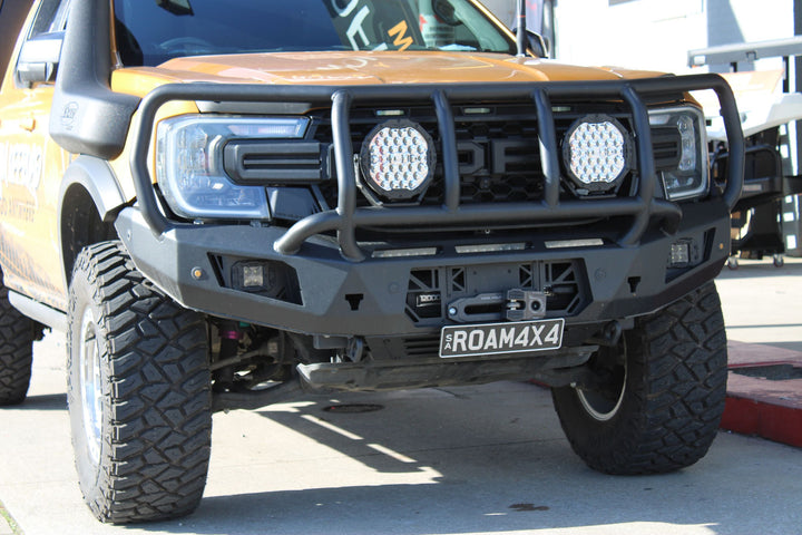 Close-up of the bull bar with two round driving lights on the Roam Offroad ute