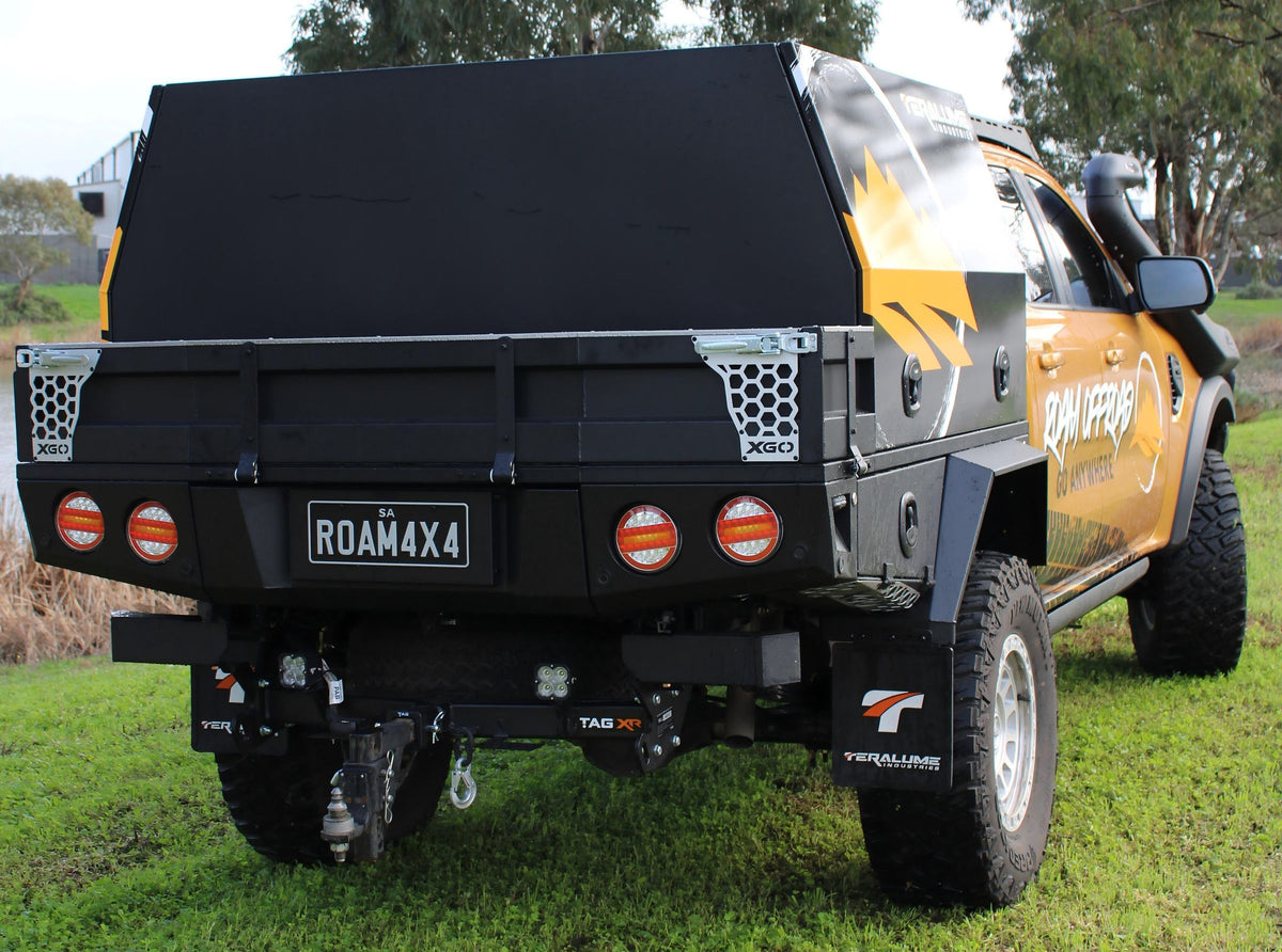 Rear of the Roam Offroad ute: canopy, tray, round tail lights and tow hitch