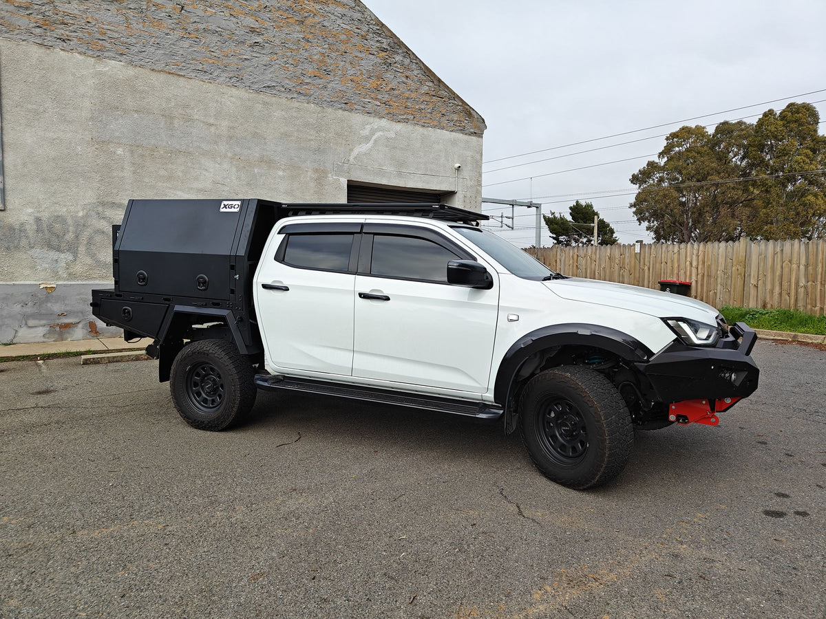 Side profile of the D-Max with canopy and roof rack