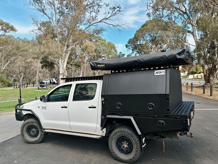 Side view of the Hilux showing the XGO canopy and awning