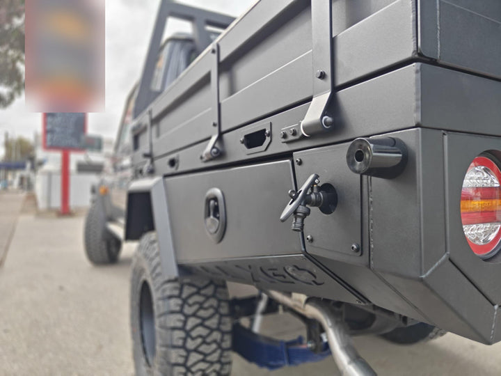 Close-up of an XGO tray toolbox, latch and tail light