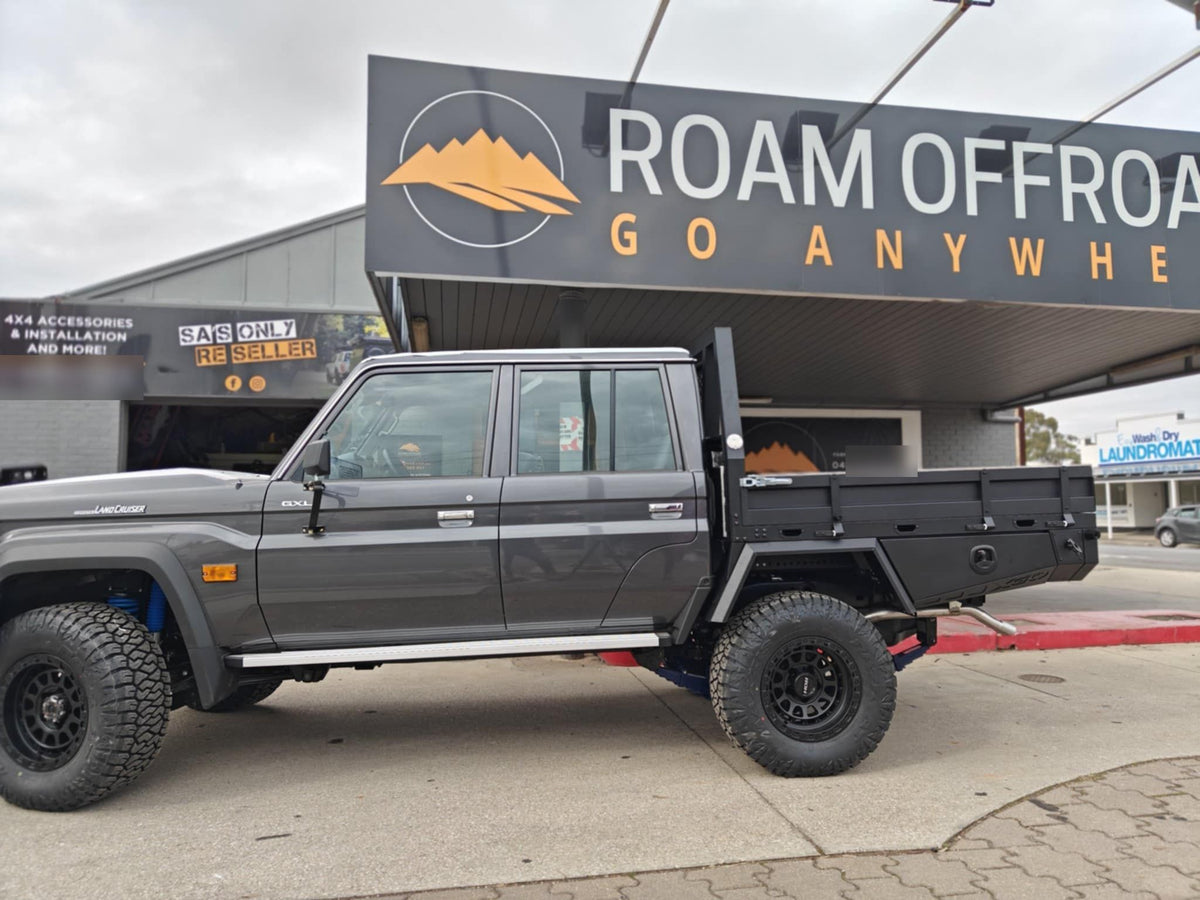 Side view of the LandCruiser 79 Series with the XGO tray and headboard